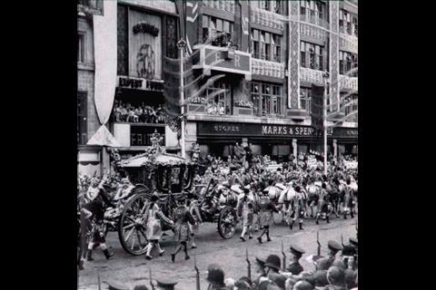 The Queen’s coronation procession passes by Marks & Spencer’s Marble Arch store in July 1953